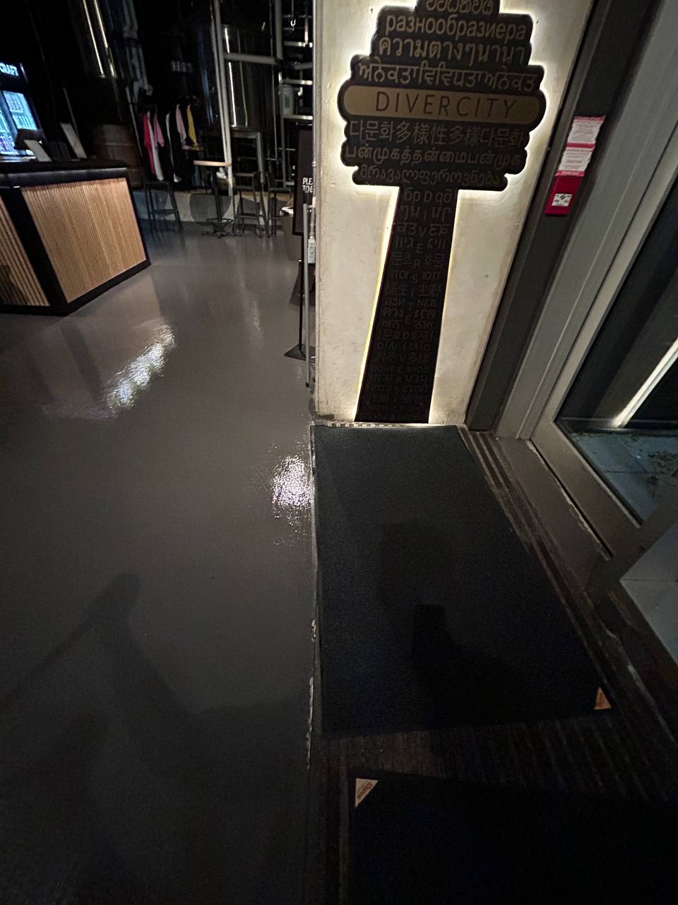 Restaurant entrance after GLAZE cleaning — clean, polished floors