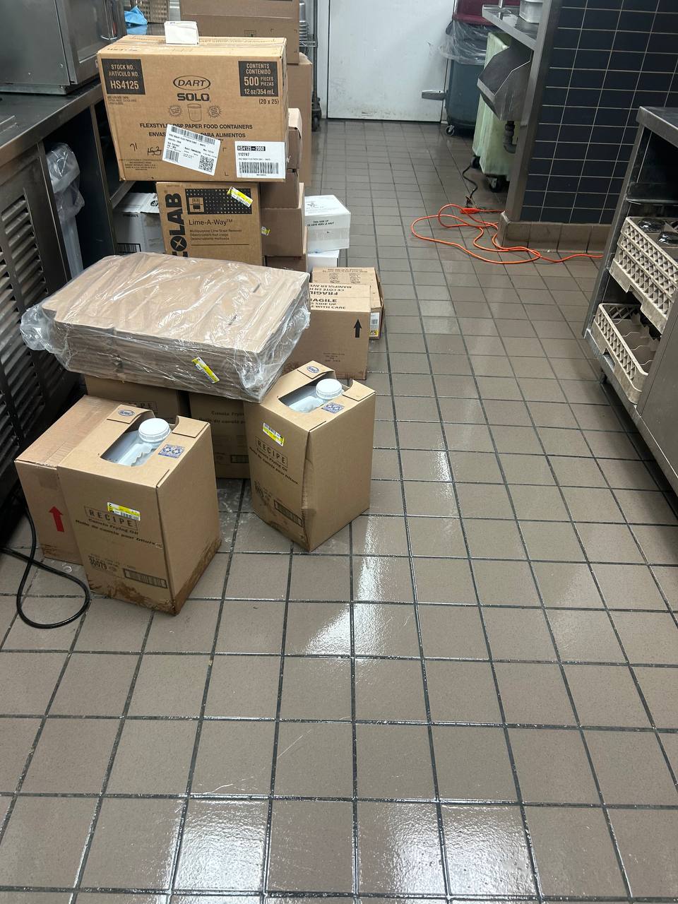 Glossy clean kitchen tile floor